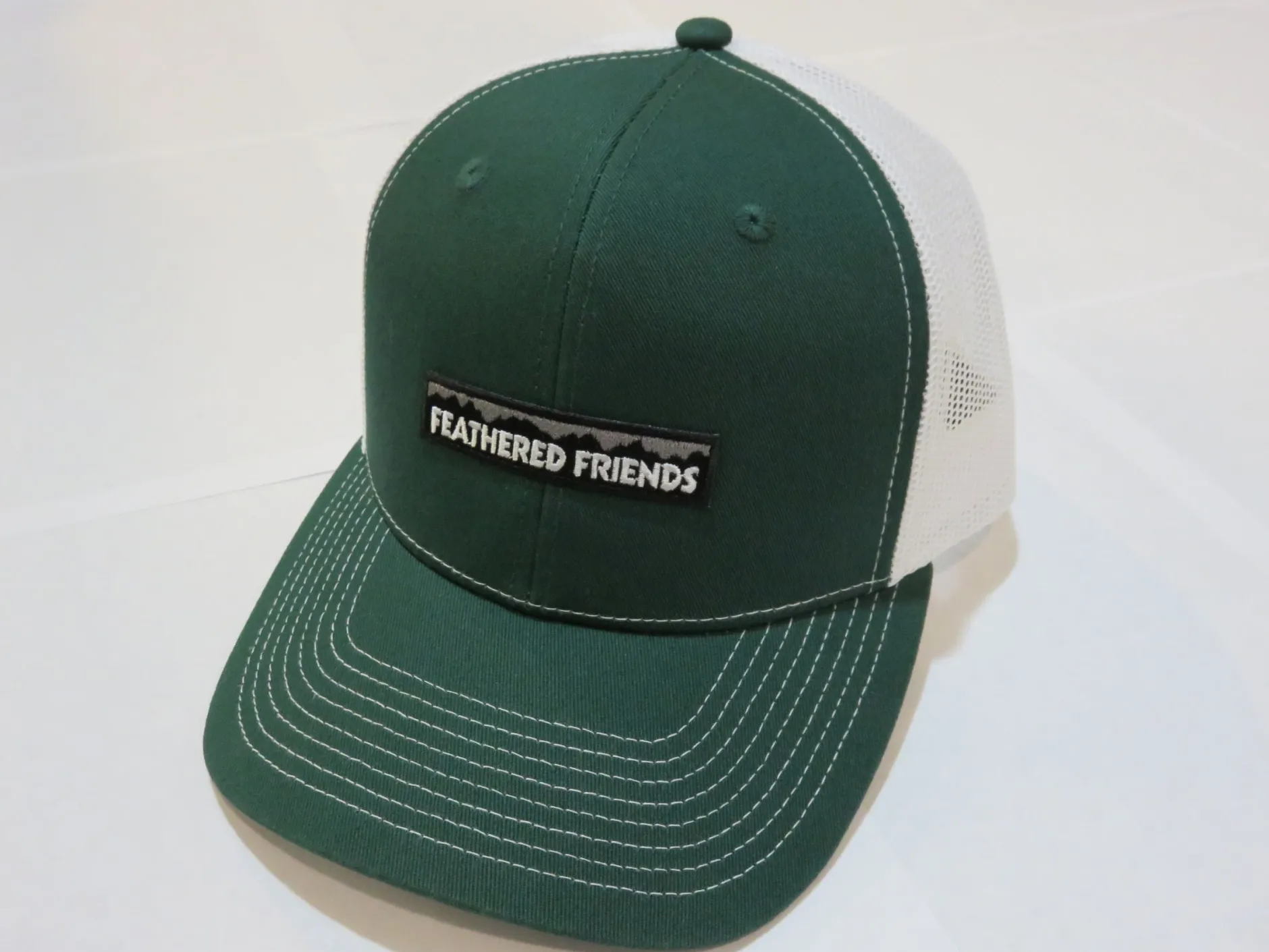Feathered Friends Pro Style Trucker Mountain Logo Patch Hat