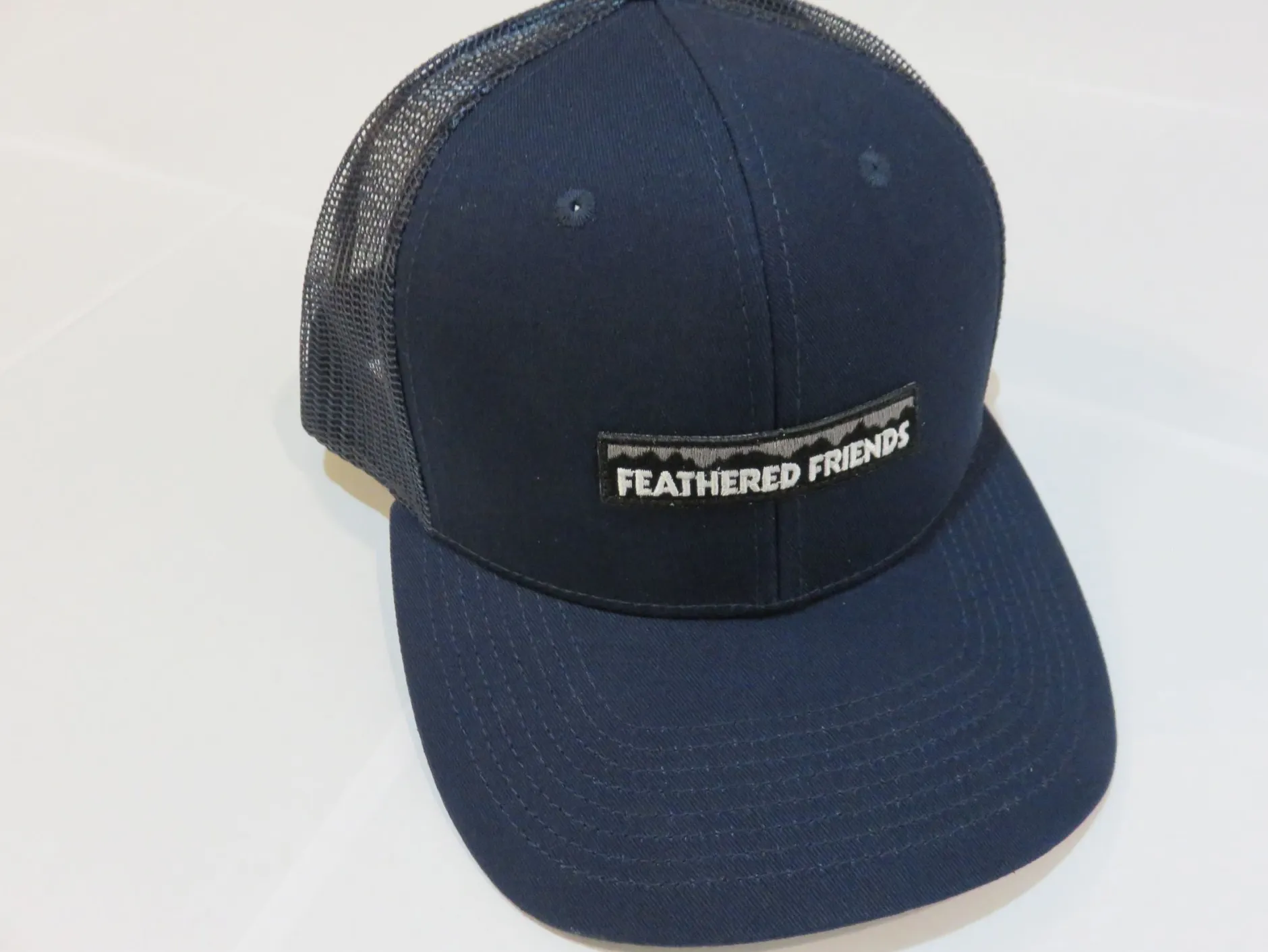 Feathered Friends Pro Style Trucker Mountain Logo Patch Hat