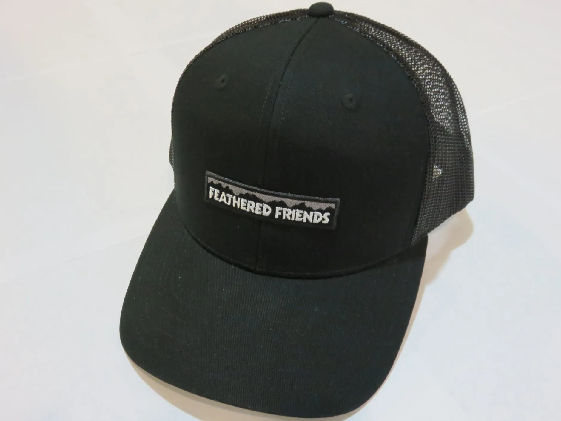 Feathered Friends Pro Style Trucker Mountain Logo Patch Hat