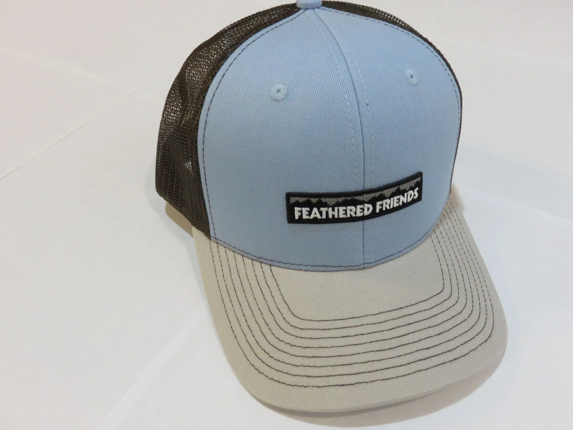 Feathered Friends Pro Style Trucker Mountain Logo Patch Hat