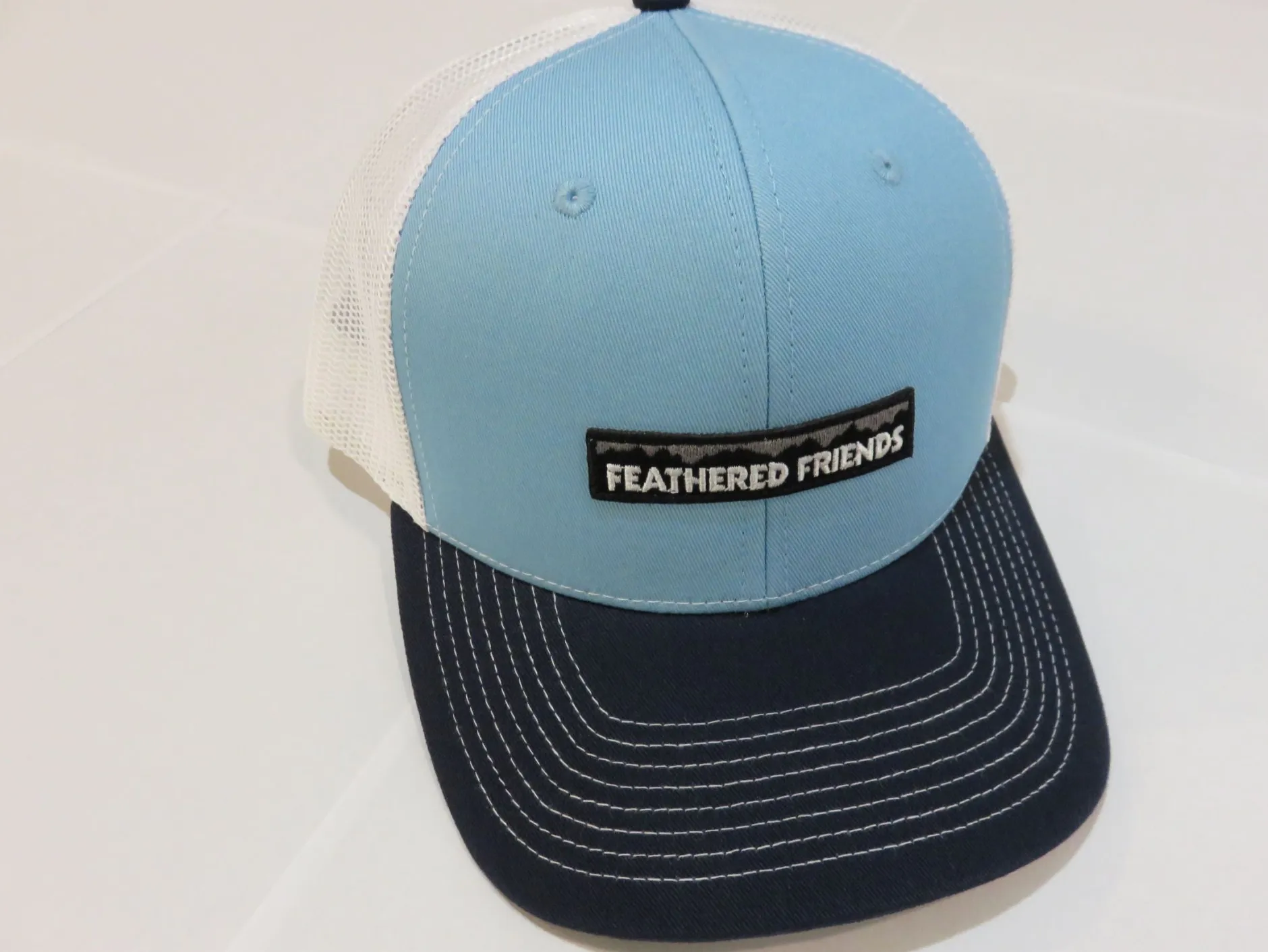 Feathered Friends Pro Style Trucker Mountain Logo Patch Hat