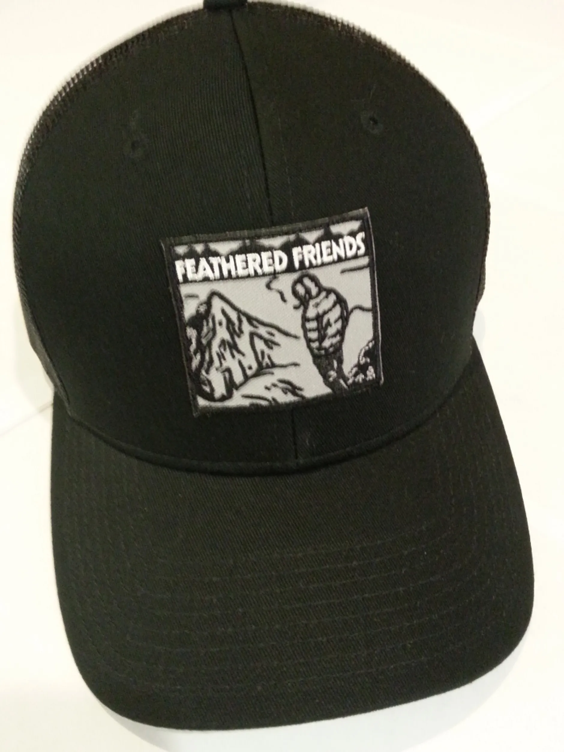 Feathered Friends Smoking Man Pro Style Trucker Hat
