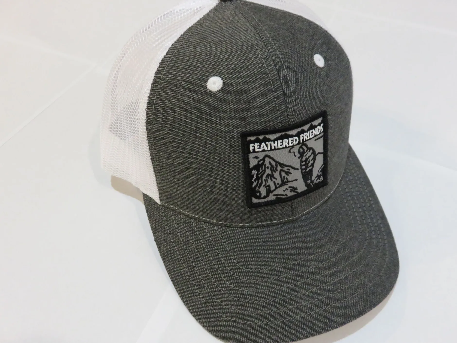 Feathered Friends Smoking Man Pro Style Trucker Hat