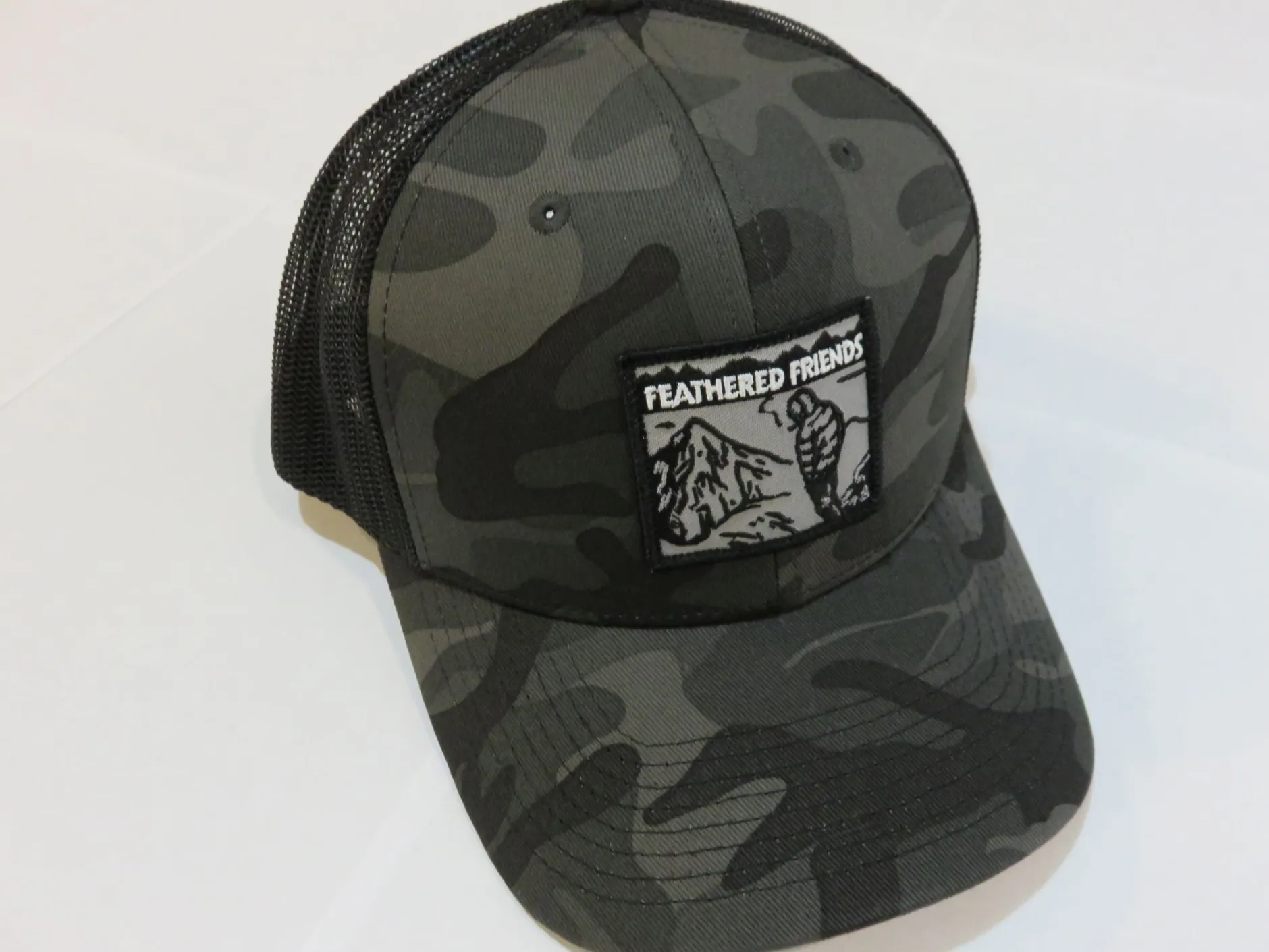 Feathered Friends Smoking Man Pro Style Trucker Hat