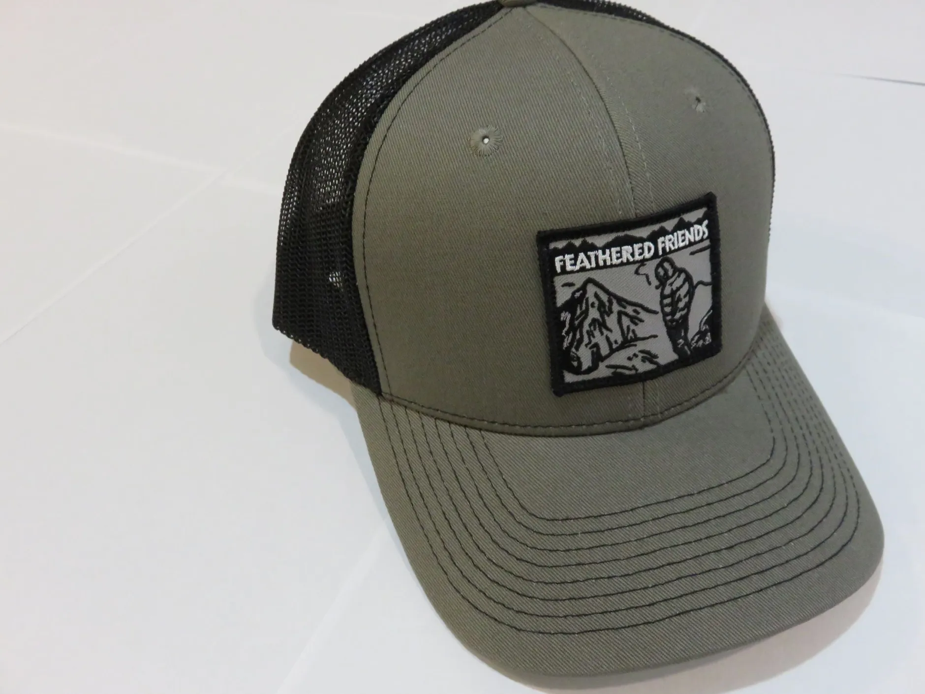Feathered Friends Smoking Man Pro Style Trucker Hat
