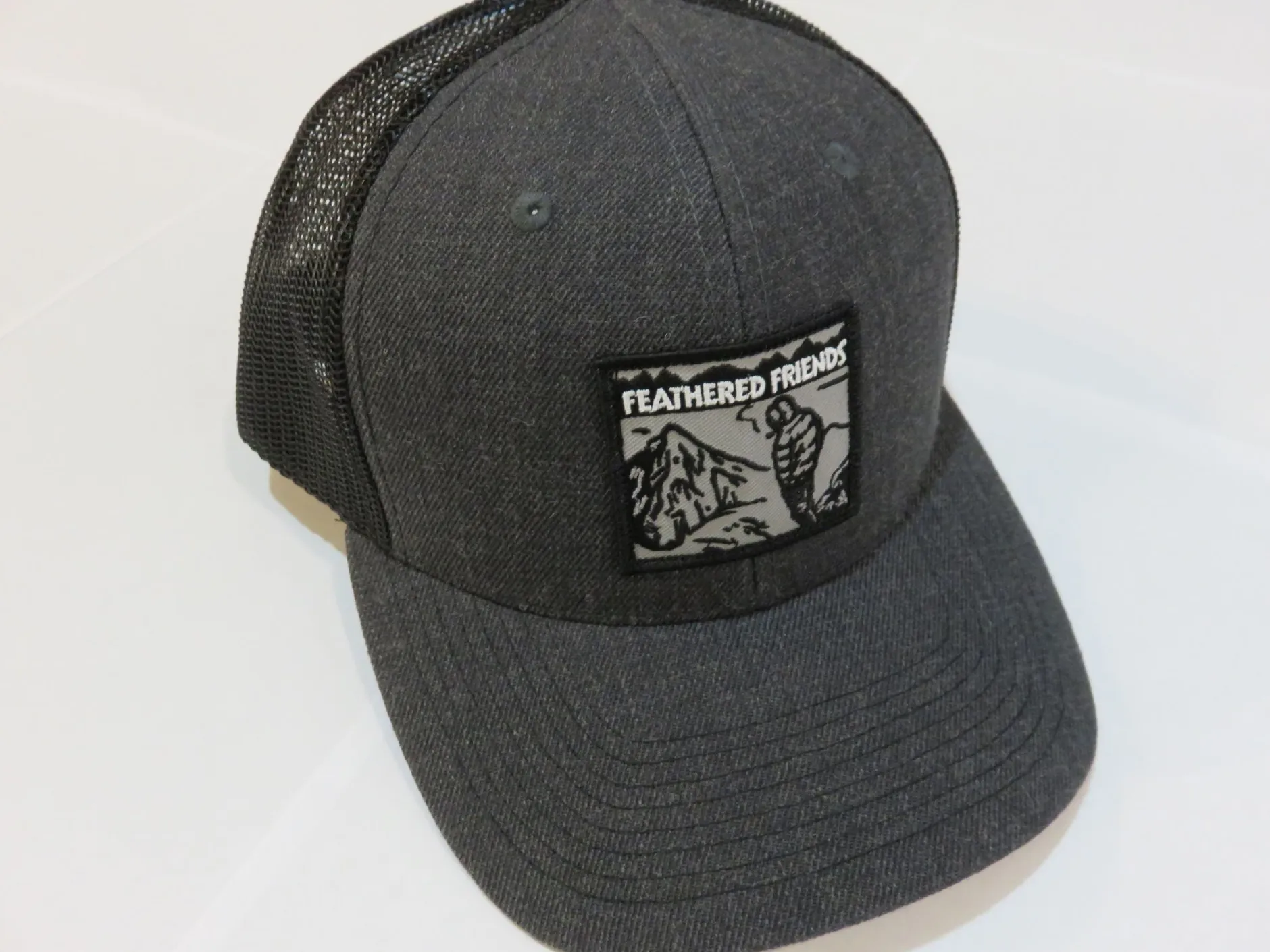 Feathered Friends Smoking Man Pro Style Trucker Hat