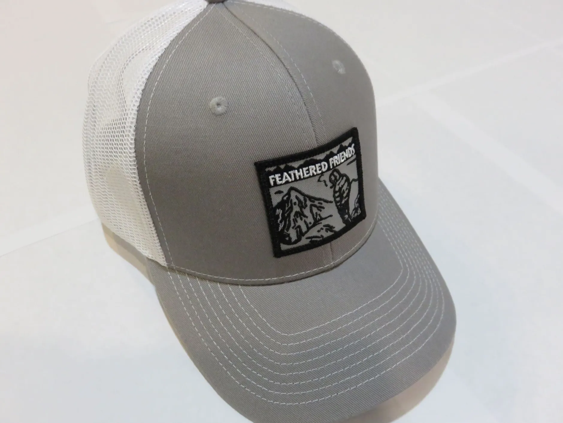 Feathered Friends Smoking Man Pro Style Trucker Hat